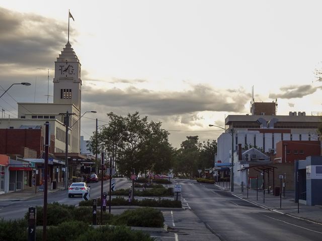 Horsham's main street in late light, with the art deco T&G clock tower.