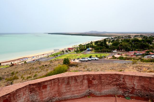 View from Hummock Hill over Whyalla's foreshore park, beach and the calm water of the gulf.